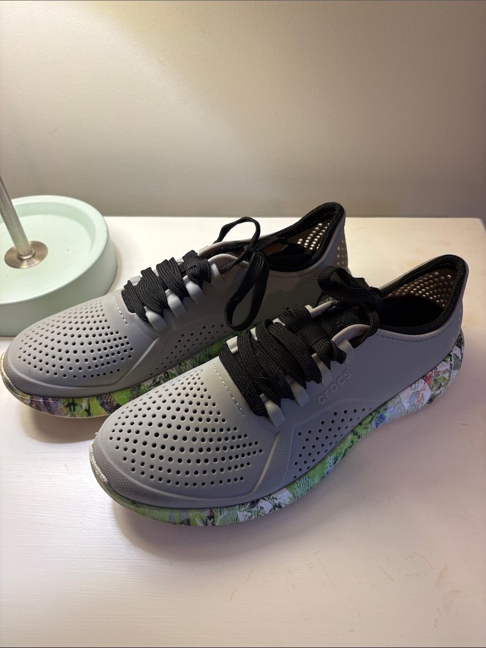 CROCS women’s Gray Sneakers with Black Laces and Floral-Print Midsole